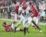  ?? CURTIS COMPTON/ATLANTA JOURNAL-CONSTITUTI­ON ?? Georgia running back Sony Michel runs for the game-winning touchdown during overtime in the Rose Bowl on Monday against Oklahoma at Pasadena, Calif. Georgia won 54-48.