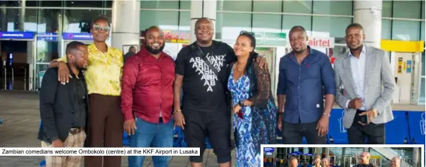  ?? ?? Zambian comedians welcome Ombokolo (centre) at the KKF Airport in Lusaka