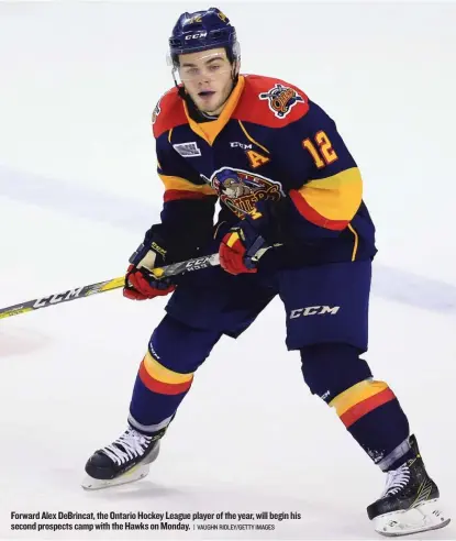  ?? | VAUGHN RIDLEY/ GETTY IMAGES ?? Forward Alex DeBrincat, the Ontario Hockey League player of the year, will begin his second prospects camp with the Hawks on Monday.