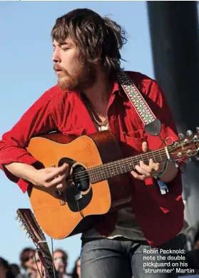  ??  ?? Robin Pecknold: note the double pickguard on his ‘strummer’ Martin