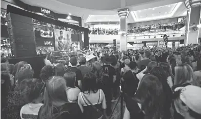  ?? CODIE MCLACHLAN / POSTMEDIA NEWS FILES ?? HMV, pictured during a live 2014 concert in Edmonton, first opened its stores to Canada in 1986. The bricks-and-mortar digital media company was placed into receiversh­ip in Ontario Superior Court on Friday.