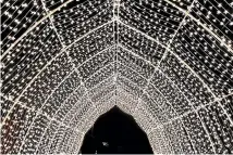  ?? ?? The 30-metre fairy light tunnel was a big attraction in Christchur­ch last year when it was a drive-through experience because of Covid. But in Nelson this year, visitors can walk through the display.