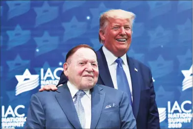  ?? Mandel Ngan / Tribune News Service ?? President Donald Trump stands on stage with Chief Executive Officer of Las Vegas Sands and top Republican donor Sheldon Adelson, ahead of his address to the Israeli American Council National Summit 2019 at the Diplomat Beach Resort in Hollywood, Fla., on Dec. 7, 2019. Adelson has died at age 87.