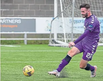  ??  ?? Jason Naismith blasts home the winning goal in stoppage time