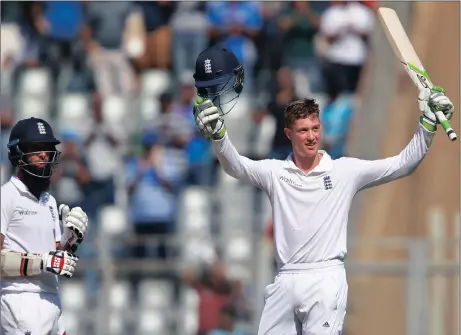 ?? Picture: DANISH SIDDIQUI, REUTERS ?? A NEW JET-SETTER: Keaton Jennings, son of former South African wicketkeep­er and coach Ray, celebrates his century on Test debut for England at the Wankhede Stadium yesterday.
