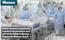  ??  ?? Health workers and patients remain in the intensive care unit of the Gilberto Novaes Hospital in Manaus, Brazil Manaus