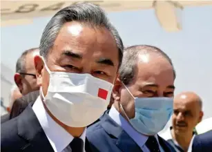  ?? (AFP/Getty) ?? China’s foreign minister Wang Yi has been trave ll ing the wor l d offering up Covid vaccines