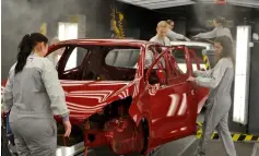  ?? — AFP photo ?? Employees work on the assembly line of the Peugeot 208 car by French car maker PSA Peugeot Citroen at the company’s automobile factory in Trnava, western Slovakia. Slovakia, the world’s largest per capita car producer, stands to be hardest hit if US...