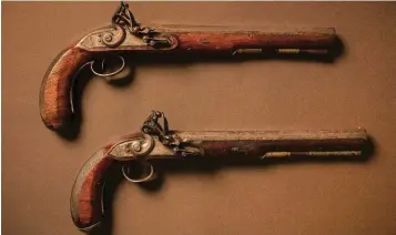 ??  ?? The two Obadiah Wisdom made pistols which are up for auction.