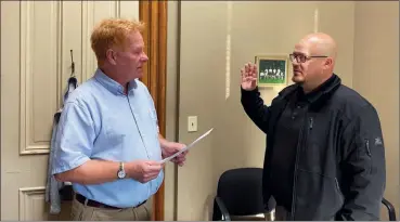  ?? (PHOTO SUBMITTED) ?? Adams County Republican Chairman Steve Justus appoints Anthony (Tony) Davidson to the position of Clerk Treasurer for the town of Geneva