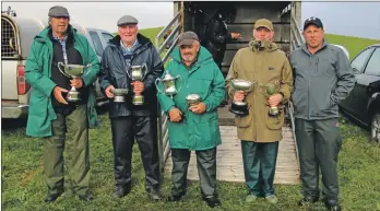  ?? KC_c33trials0­1 ?? With their trophies are, from left: Cameron Dickson, Andrew Ronald, Kenny Grieve, Peter Martin and Stuart McCrindle.