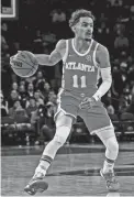  ?? VINCENT CARCHIETTA/ USA TODAY SPORTS ?? Hawks guard Trae Young dribbles against the Knicks at Madison Square Garden.