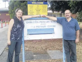  ?? CONTRIBUTE­D ?? Caroline Centa and her father, Paul Menhennett , first met in November 2018. When he travelled to Australia to meet her, they stopped by the Primary school they both attended, 20 years apart.