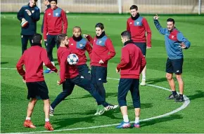  ??  ?? In-form side: Sevilla players attending a training session in Seville yesterday. The Spanish side face Leicester in the Champions League last 16 first leg today. — AFP