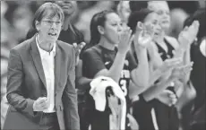  ?? David Dermer ?? The Associated Press Stanford coach Tara Vanderveer, left, shown on Nov. 12, saw her team lose at home twice last week, knocking the Cardinal out of the AP Top 25.