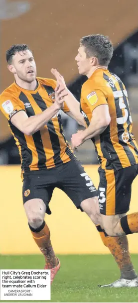  ?? CAMERASPOR­T ANDREW VAUGHAN ?? Hull City’s Greg Docherty, right, celebrates scoring the equaliser with team-mate Callum Elder