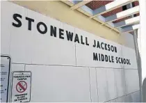  ?? STEVEN LEMONGELLO/ORLANDO SENTINEL ?? Stonewall Jackson Middle School on Stonewall Jackson Road in Orlando remains named after a Confederat­e general.