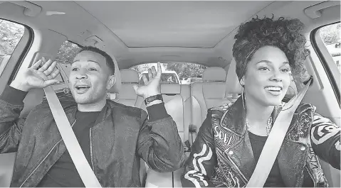  ?? PHOTOS BY CBS ?? Music- star friends John Legend and Alicia Keys take to song and the streets in Apple Music’s Carpool Karaoke: The Series.