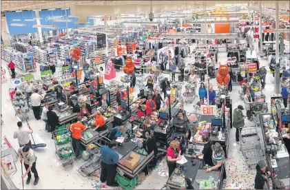  ?? KENN OLIVER/THE TELEGRAM ?? As part of Loblaws annual Market Moments campaign to celebrate and thank customers, Dominion’s Cabot Square Market on Stavanger Drive was randomly selected on Wednesday to be one of the locations to award $250 in free groceries to customers in line at...