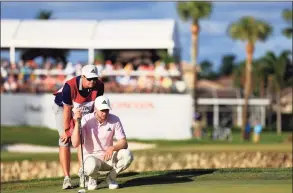  ?? Mike Ehrmann / Getty Images ?? Daniel Berger lines up a putt on the 14th green during the third round of The Honda Classic on Saturday in Palm Beach Gardens, Fla.