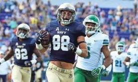  ??  ?? Navy athletics operates as a private non-profit. TOMMY GILLIGAN/USA TODAY