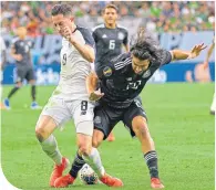  ??  ?? Bryan Oviedo (left) in action for Costa Rica