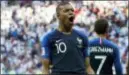  ?? DAVID VINCENT — THE ASSOCIATED PRESS ?? Kylian Mbappe celebrates after scoring against Argentina.