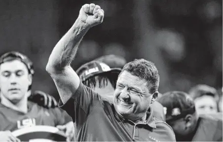  ?? C.B. Schmelter / Associated Press ?? LSU coach Ed Orgeron’s success might be a little shocking to people who saw Adam Sandler’s “Waterboy” character as a typical Cajun. “You were laughing at that character; nobody’s laughing at coach Orgeron now,” a Louisiana historian says.