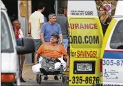  ?? DAVID SANTIAGO / MIAMI HERALD ?? Patients are evacuated Wednesday from Krystal Bay Nursing and Rehabilita­tion Center after losing power in the aftermath of Hurricane Irma in North Miami Beach.