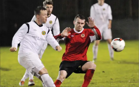  ??  ?? Ross McLoughlin in action against Inishowen on Saturday evening. Pic: Carl Brennan.