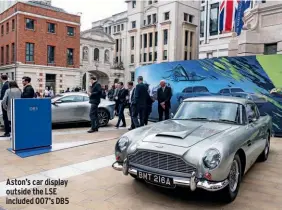  ??  ?? Aston’s car display outside the LSE included 007’s DB5