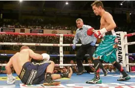  ?? LEVI DERESAS / PHILBOXING.COM ?? WBOjunior featherwei­ght champion Nonito Donaire Jr. floors Hungarian Zsolt Bedak for the first time in the second round.