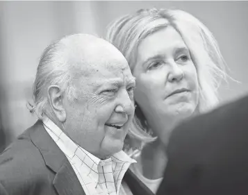  ?? DREW ANGERER, GETTY IMAGES ?? Roger Ailes and his wife, Elizabeth Tilson, leave the News Corp. building in New York City on Tuesday. Among the biggest problems for Fox: How to replace Ailes’ discerning eye for talent.