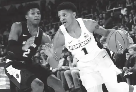  ?? FFile photo by Ernest A. Brrown ?? Brewster Academy coach Jason Smith said Providence College freshman guard and 2017 Brewster graduate Makai Ashton-Langford (1) has made winning his most important priority on the court. Ashton-Langford and the Friars face UMass today at 3 p.m. in...