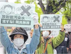  ?? FOTO: XIAOYI/DPA ?? Widerstand von allen Seiten: auch vor Ort regt sich Protest.