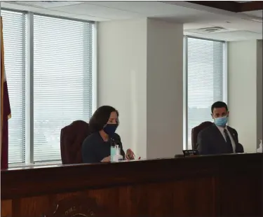  ?? RACHEL RAVINA — MEDIANEWS GROUP ?? Montgomery County Commission­ers Chairwoman Valerie Arkoosh conducts the county commission­ers meeting with distance from Commission­er Joe Gale, right.