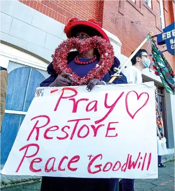  ?? Associated Press ?? G.A. Breedlove stands outside of the historic Ebenezer First Baptist Church in honor of Martin Luther King Jr. Day on Monday in Atlanta, Ga.