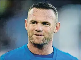  ?? OLI SCARFF / AFP ?? Wayne Rooney con el Everton
