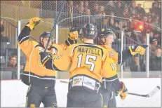  ?? TINA COMEAU ?? The Yarmouth Mariners celebrate another goal during another win on home ice on Dec. 7 against Truro.