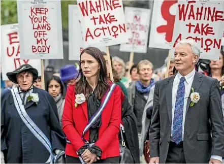  ?? JASON DORDAY/STUFF ?? Prime Minister Jacinda Ardern and Auckland mayor Phil Goff attend the Suffrage Sunrise Celebratio­n at Aotea Square in Auckland yesterday.