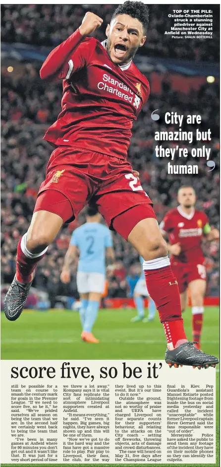  ??  ?? TOP OF THE PILE: Oxlade-Chamberlai­n struck a stunning piledriver against Manchester City at Anfield on Wednesday