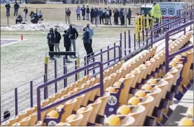  ?? James Franco / Special to the Times Union ?? Fans were not allowed during the Ualbany football home opener, but some gathered to watch outside the fence of Casey Stadium.