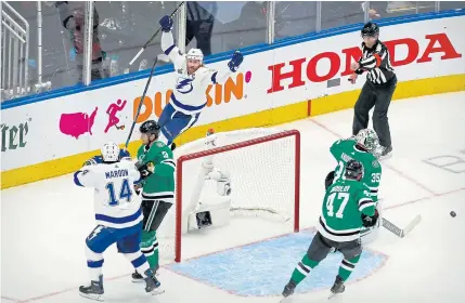  ?? USA TODAY SPORTS ?? Lightning centre Steven Stamkos, top, celebrates scoring a goal against the Stars during the first period.