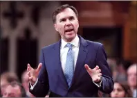  ?? CP FILE PHOTO ?? Minister of Finance Bill Morneau rises during Question Period in the House of Commons on Parliament Hill.