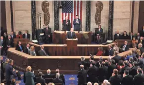  ??  ?? President Donald Trump delivers his first State of the Union address Jan. 30, 2018, in the House chamber of the Capitol.