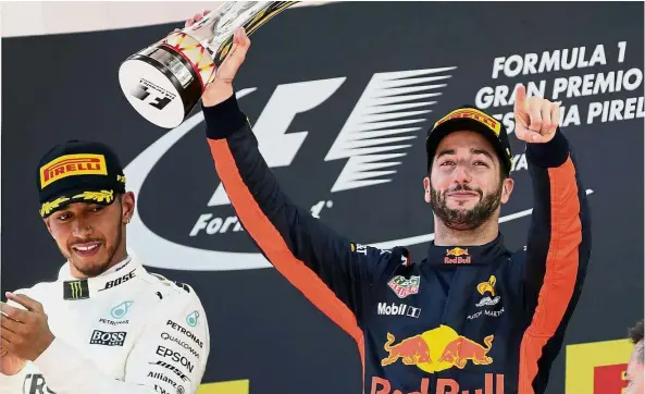  ??  ?? Good form: Red Bull driver Daniel Ricciardo of Australia celebrates after finishing third at the Spanish Grand Prix at the Barcelona Catalunya racetrack in Montmelo on May 14. — AP