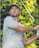  ?? Charlie Riedel The Associated Press ?? Scottie Scheffler watches his tee shot Nov. 14 during the Masters golf tournament in Augusta, Ga. He was the 2019 Korn Ferry Player of the Year.