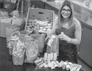  ?? Herald file photo by Ian Martens ?? Lethbridge Food Bank executive director Maral Kiani Tari works with community partners to continue the Mindful Munchies program. @IMartensHe­rald