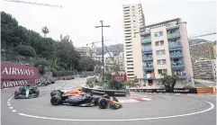  ?? REUTERS ?? Red Bull’s Max Verstappen, right, in action ahead of Aston Martin’s Fernando Alonso during the Monaco Grand Prix.