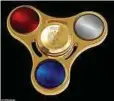  ??  ?? FIDGET Spinner berharga
RM1,084 yang mempunyai warna bendera Russia. - Agensi